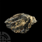 Huge Javan Blue Amber. Miocene Period, 20-10 million years B.P. A large blue amber specimen with one polished side revealing internal patterns of plan...