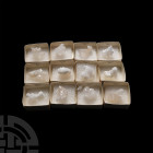 Mixed Calcite Crystal Specimen Collection. A group of twelve white and clear calcite specimens; each held in a white card collector's tray accompanied...
