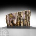 Large Amethyst Cut Slice. A large cut amethyst slice of irregular shape; number 61 penned to reverse. 595 grams, 27.5 cm (10 3/4 in.) Mineral Imports,...