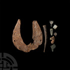 Anglo-Saxon 'Thames' Artefact Group. Mainly 6th-10th century A.D. A mixed group of mostly incomplete Thames artefacts comprising: a zoomorphic strap e...