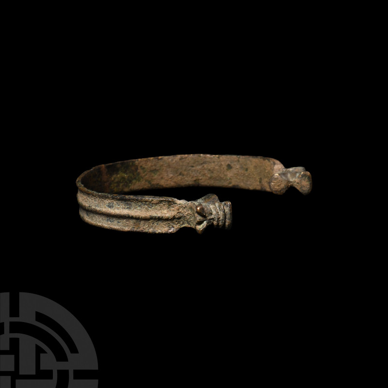 Viking Beast-Headed Bracelet. 9th-12th century A.D. A penannular bracelet compos...