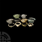 Medieval and Other Ring Collection. 12th-15th century A.D. A mixed group of bronze finger rings, each with an ornamental or engraved bezel, including ...