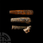 Medieval Knife Handle Group. c.13th-16th century A.D. A mixed group of three bone knife handles comprising: a D-section handle with hand scratched 'MM...