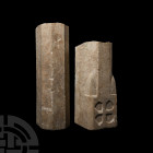 Medieval Marble Decorated Column Section. 12th century A.D. or later. Two sections of a limestone arcade pillar, D-shaped in section with facetted ang...