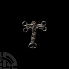 Medieval Crucifix Pilgrim's Badge. c.14th century A.D. A pilgrim's badge in the form of a cross, twin loops to each of three arms, Christ nailed to th...