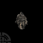 Medieval Thomas Becket Pilgrim's Badge. 14th-15th century A.D. A lead-alloy pilgrim's badge designed as the head of Thomas Becket, the martyred Archbi...