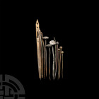 Medieval Pin Collection. c.13th-17th century A.D. A mixed group of pins with slender stems and bulbous heads; part of a bodkin; three needles. 20 gram...