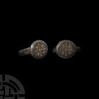 Medieval Ring with Cross Crosslet. 15th-16th century A.D. A bronze finger ring with a thin circular hoop, discoid bezel with central cross pattée and ...