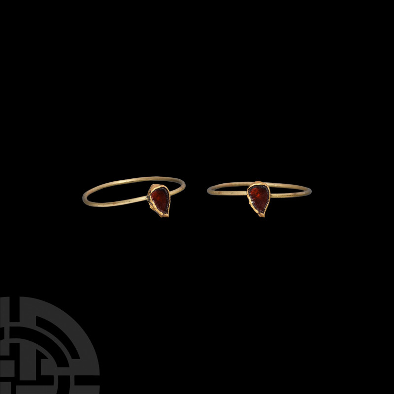 Medieval Gold Ring with Teardrop Garnet. 13th century A.D. A tear-shaped bezel s...