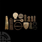Medieval Artefact Collection. Mainly 10th-14th century A.D. A mixed group of fourteen artefacts comprising: a group of six book clasps of different si...