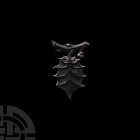 Medieval Holly Leaf and Branch Dyer's Livery Badge. c.15th century A.D. A dyer's livery badge in the form of a holly leaf and stem with cluster of thr...