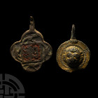 Medieval Heraldic Horse Harness Pendant Group. 13th-15th century A.D. A group of two heraldic horse harness pendants comprising: one gilt discoid exam...