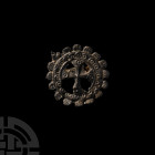 Medieval Five Wounds of Christ Pilgrim's Badge. 14th-15th century A.D. A lead-alloy pilgrim's badge composed of a circular frame, series of semi-circu...