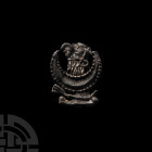 Medieval Mary and Child Pilgrim's Badge. 15th-16th century A.D. A pilgrim's badge in the form of Mary and the infant Christ on a crescent moon, stylis...