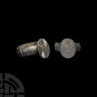 Medieval Ring with Geometric Design. 14th-15th century A.D. A bronze finger ring with thick carinated shank, stud to the underside and incised linear ...