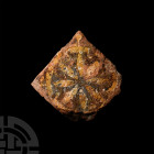 British Medieval 'Thames' Glazed Heraldic Floor Tile with Sun Burst. 13th-14th century A.D. A glazed floor tile decorated with an eight-armed sunburst...