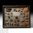 Anglo-Norman Minety Moor Pottery Sherd Display. 13th century A.D. A glazed wooden display board with mounted sherds of pottery from Minety Moor, Wilts...