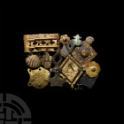 Medieval and Later Belt Mount Group. Mainly 14th-18th century A.D. A mixed group of decorative belt mounts comprising: a Lombardic letter M dated c.13...
