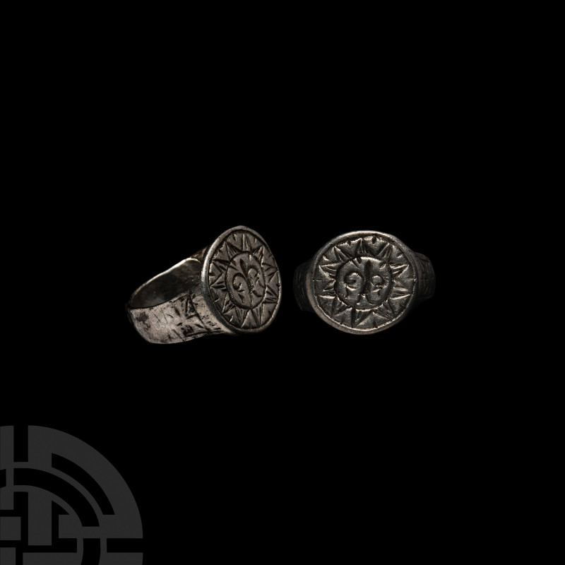 Medieval Silver Ring with Fleur-de-Lis. c.12th century A.D. A silver ring with D...
