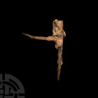 Medieval Pricket Candlestick. c.1270-1400 A.D. An iron candle holder composed of two tapering rectangular-section arms arranged at right angles and tu...