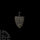 Medieval Heraldic 'De Bohun Family' Horse Harness Pendant. 13th-14th century A.D. A heater-shaped horse harness pendant with cotised bend between six ...