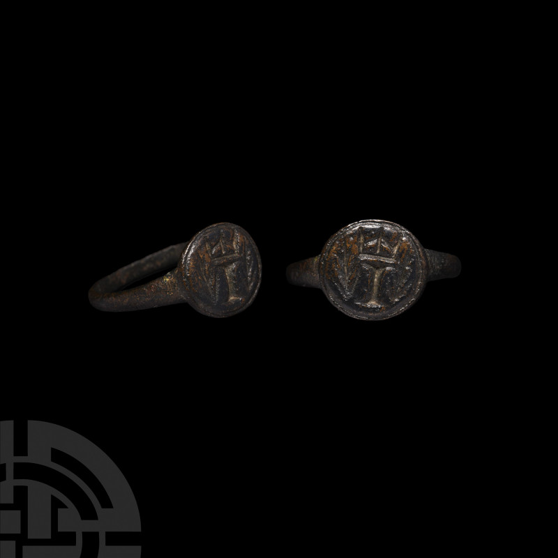 Medieval Ring with Crowned 'I'. 15th century A.D. A bronze finger ring with disc...