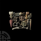 Medieval Artefact Collection. 13th-15th century A.D. A mixed group of artefacts including buckles, a knife pommel, clothes clasps, furniture fittings,...