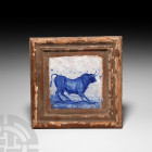 Spanish Blue and White Tile with Bull. 18th-19th century A.D. A ceramic tile with blue pastoral scene of a bull standing in a field, trees in the dist...