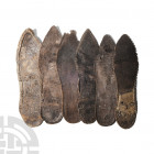 Medieval and Other Leather Shoe Sole Collection. 16th-18th century A.D. A group of six leather shoe soles with perforations for attachment of the shoe...