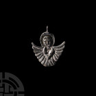 Post Byzantine Silver Pendant. 17th-18th century A.D. A silver pendant formed as a nimbate winged angel (cherub), suspension loop above. See similar p...