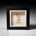 Framed Italian Carved Bone Plaque. 17th century A.D. A framed carved cow bone plaque bearing a cherub in raised relief. 585 grams, 26.3 x 26.3 cm (10 ...