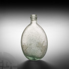 London and South Western Railway Glass Flask. 19th-early 20th century A.D. A glass flask-shaped bottle with short neck and stepped rim, raised letters...