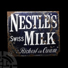 Edwardian 'Nestle's Milk' Enamelled Advertising Sign. c.1910 A.D. Enamelled iron advertising sign panel with 'NESTLE'S / SWISS MILK / The Richest in C...