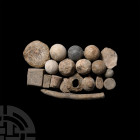 Musket Ball and Other Artefact Group. 17th century A.D. A mixed group of lead artefacts comprising: a small group of musket balls; small diameter pipe...