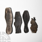 Medieval and Other Leather Shoe Sole Collection. 16th-18th century A.D. A group of five leather shoe soles with perforations for attachment of the sho...