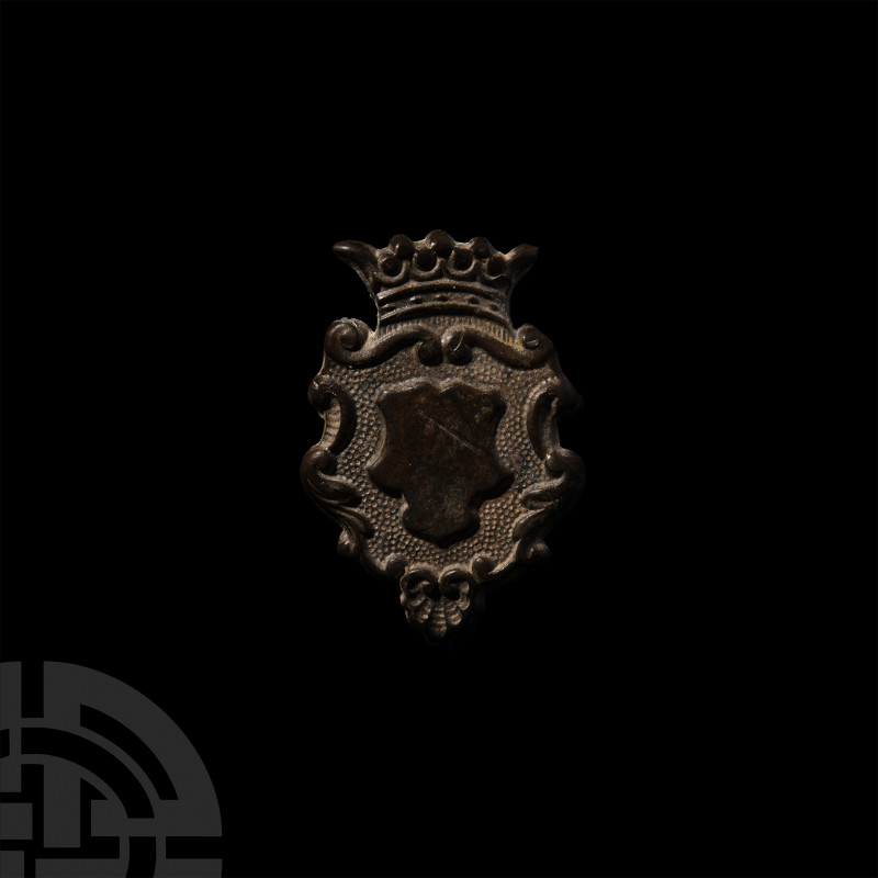 Heraldic Mount. Early 19th century A.D. A bronze armorial mount comprising a pou...