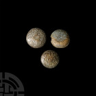 Stuart Period Cloak Button Group. 17th century A.D. A group of three buttons composed of domed faces and pierced lugs to reverse, stylised geometric f...