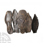 Medieval and Other Leather Shoe Sole Collection. 16th-18th century A.D. A group of five leather shoe soles, most with perforations to the perimeter fo...