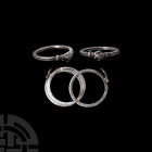 Silver 'Clasped Hands' Gimmel Ring with Hidden Heart. 19th century A.D. A silver gimmel ring with clasped hands concealing a love heart; the hoop is c...