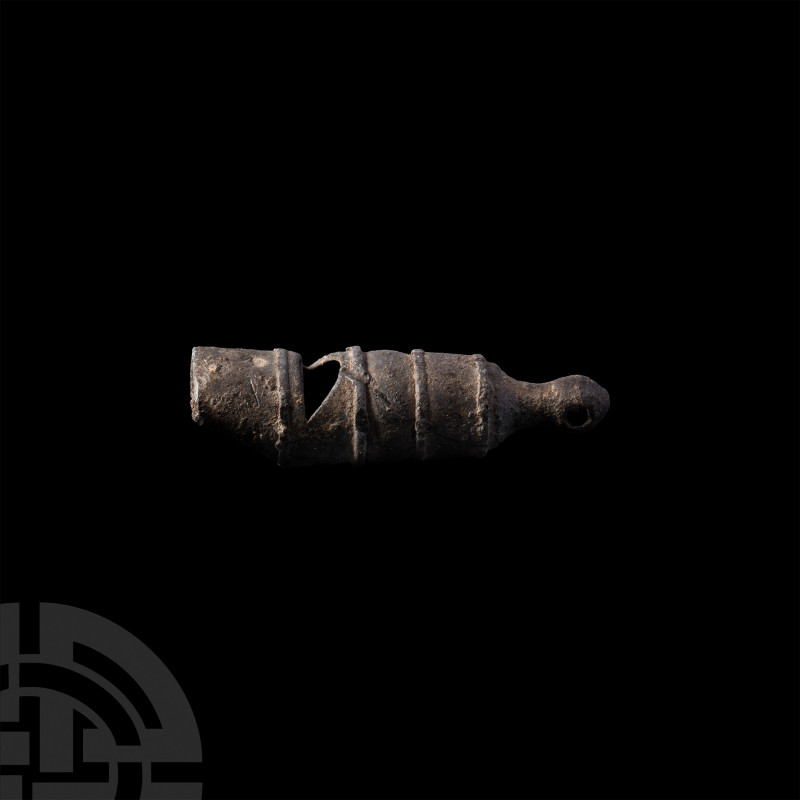 Whistle. 18th-19th century A.D. A lead-alloy whistle with crescentic sounding ho...