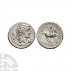 Pub Crepusius - Horseman AR Denarius. 82 B.C. Rome mint. Obv: laureate heaf of Apollo right with sceptre over shoulder; grapes below chin and monogram...