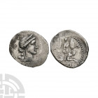 Julius Caesar - Trophy AR Denarius. 46-45 B.C. Spanish mint. Obv: diademed head of Venus right. Rev: trophy of Gallic arms between seated male and fem...