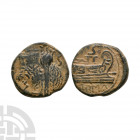 Celti-Iberiian - Imitative AE Unit. 1st century B.C. Copying a Roman Republic semis issue. Obv: laureate bust of Saturn right with S behind. Rev: gall...