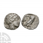 Attica - Athens - Owl AR Tetradrachm. 527-430 B.C. Obv: helmetted head of Athena right. Rev: owl standing right head facing with olive spray behind an...