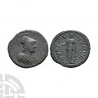Elagabalus - Lydia - Thyatira - Bronze. 218-235 A.D. Thyatira mint. Obv: helmeted bust right. Rev: ?V???-?????? legend with figure standing facing hol...