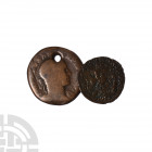 Severus Alexander and Magnentius - Bronzes [2]. 222-353 A.D. Group comprising: Severus Alexander, sestertius (pierced) and Magnentius, follis. 18.14 g...