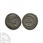 Jovian - Wreath Bronze. June 363-February 364 A.D. Sirmium mint. Obv: D N IOVIANVS P F AVG legend with diademed, draped and cuirassed bust right. Rev:...