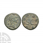 Trajan - Antioch - Wreath Bronze. 102-114 A.D. Antioch ad Orontem mint. Obv: AYTOK KAIC NER TRAIANOC CEB GERM DAK legend with laureate head right. Rev...