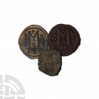 Justinian I and Later AE Folles [3]. 527-565 A.D. and later. Group comprising: Justinian I, folles (2); with a later issue. 48.14 grams total. Old Eur...