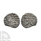 Primary Phase - Series C - Portrait AR Sceatta. 680-710 A.D. Obv: profile bust with FMCF in runes before. Rev: standard with TOTII. S. 779. 1.08 grams...